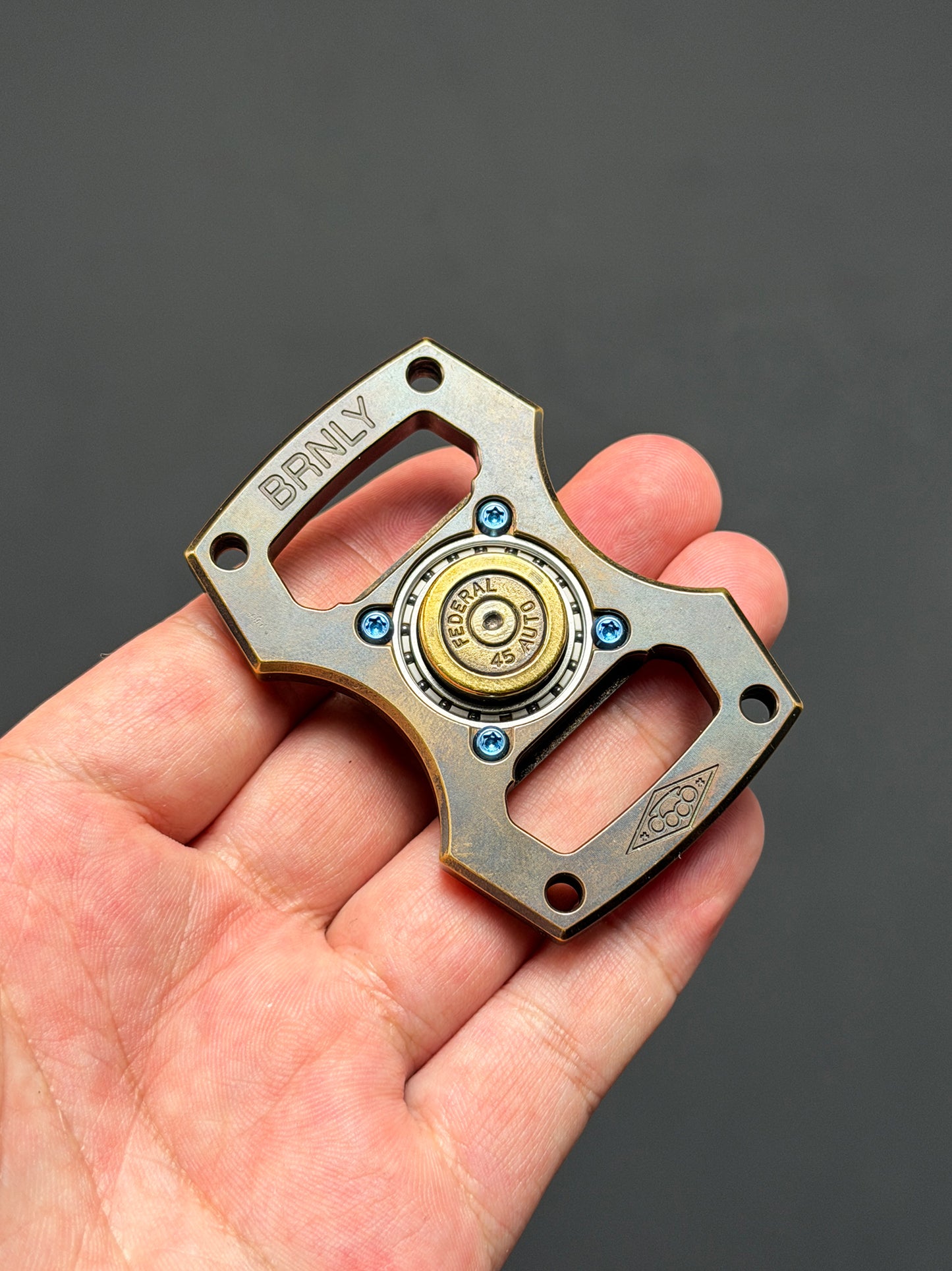 Rare Vintage Steel Flame × BRNLY Collaboration Fidget Spinner with .45 AUTO Inlay