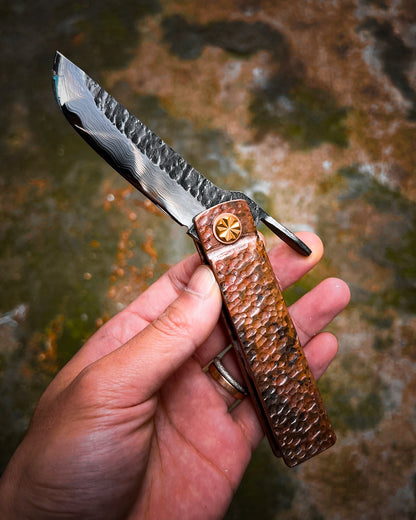 Fat Guard Style Custom Folding Knife – Hand-Forged Damascus San Mai Blade with O1 Core & Hammered Copper Handle (Limited to 20)