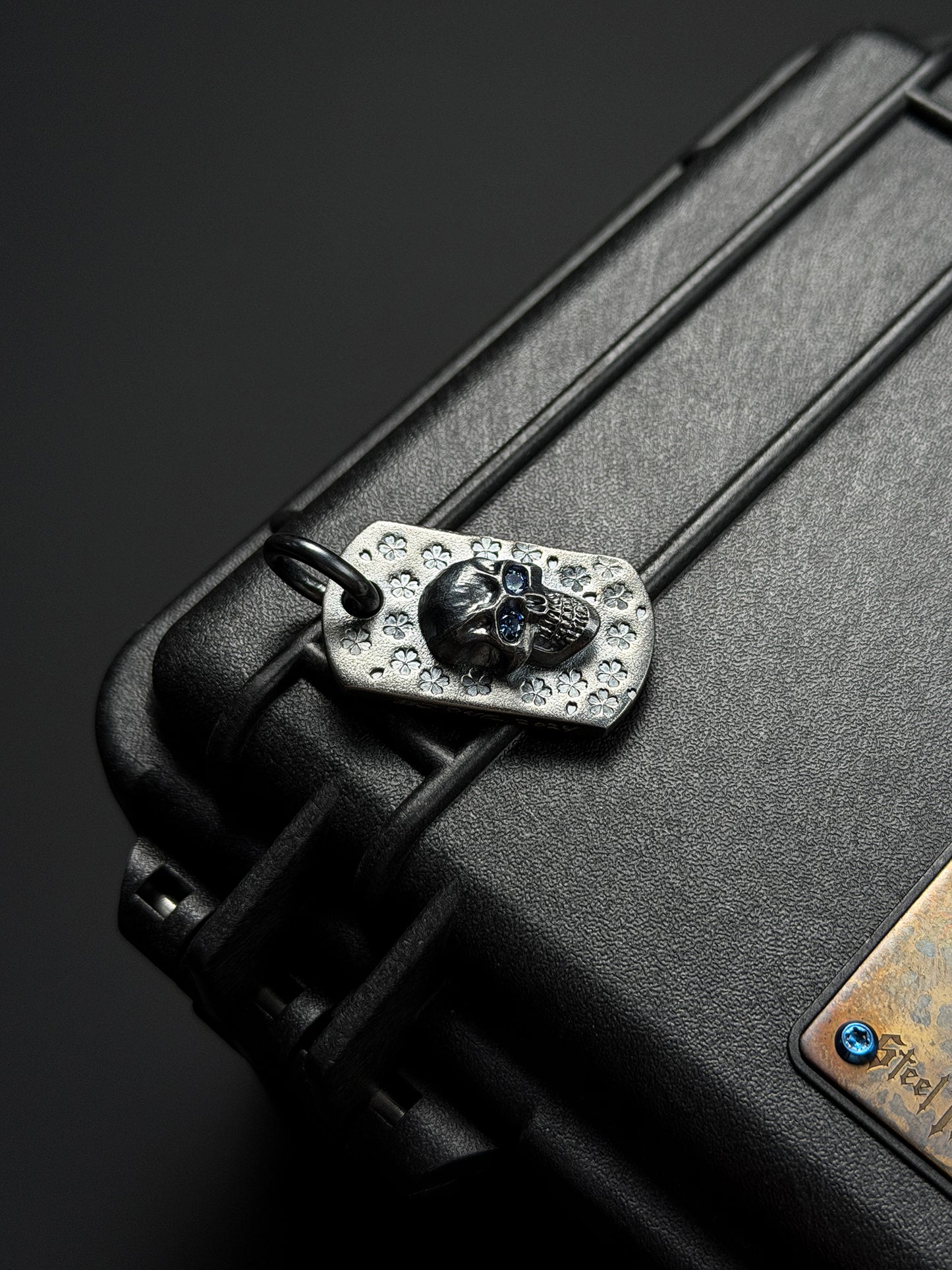 Steel Flame Sakura Pattern Dark Skull TAG Pendant — One Signature Edition | 925 Sterling Silver Base × Dark Skull × Blue Faceted Gem Eyes | Collector-Grade EDC Art