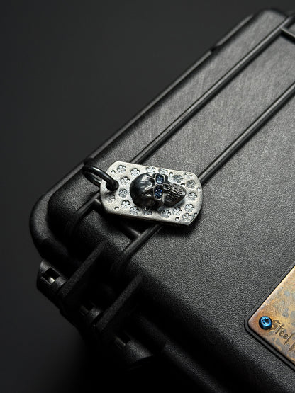 Steel Flame Sakura Pattern Dark Skull TAG Pendant — One Signature Edition | 925 Sterling Silver Base × Dark Skull × Blue Faceted Gem Eyes | Collector-Grade EDC Art