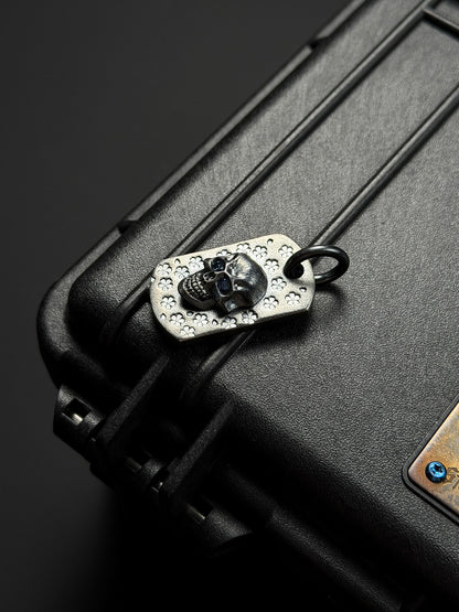 Steel Flame Sakura Pattern Dark Skull TAG Pendant — One Signature Edition | 925 Sterling Silver Base × Dark Skull × Blue Faceted Gem Eyes | Collector-Grade EDC Art