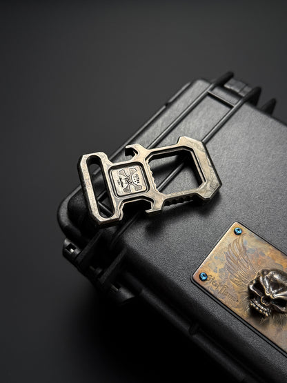 Steel Flame × HiTex Collaboration D-Ring Bottle Opener — Stainless Steel Body × 925 Silver Warrior Skull Inlay | Green Gemstone Eyes | Heavyweight EDC Art Tool