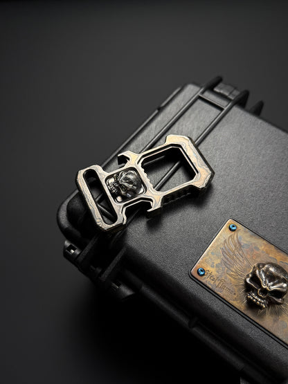 Steel Flame × HiTex Collaboration D-Ring Bottle Opener — Stainless Steel Body × 925 Silver Warrior Skull Inlay | Green Gemstone Eyes | Heavyweight EDC Art Tool