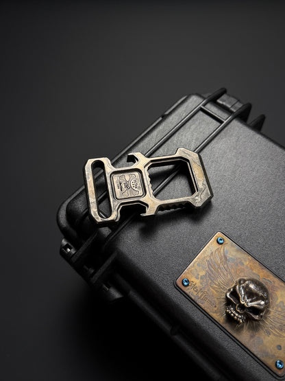 Steel Flame × HiTex Collaboration D-Ring Bottle Opener — Stainless Steel Body × 925 Silver Warrior Skull Inlay | Green Gemstone Eyes | Heavyweight EDC Art Tool