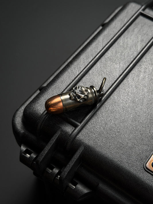 Steel Flame Bullet-Style Waterproof Capsule Pendant | Stainless Steel × Red Copper Body | Inlaid 925 Silver Warrior Skull | Logo Engraved Back