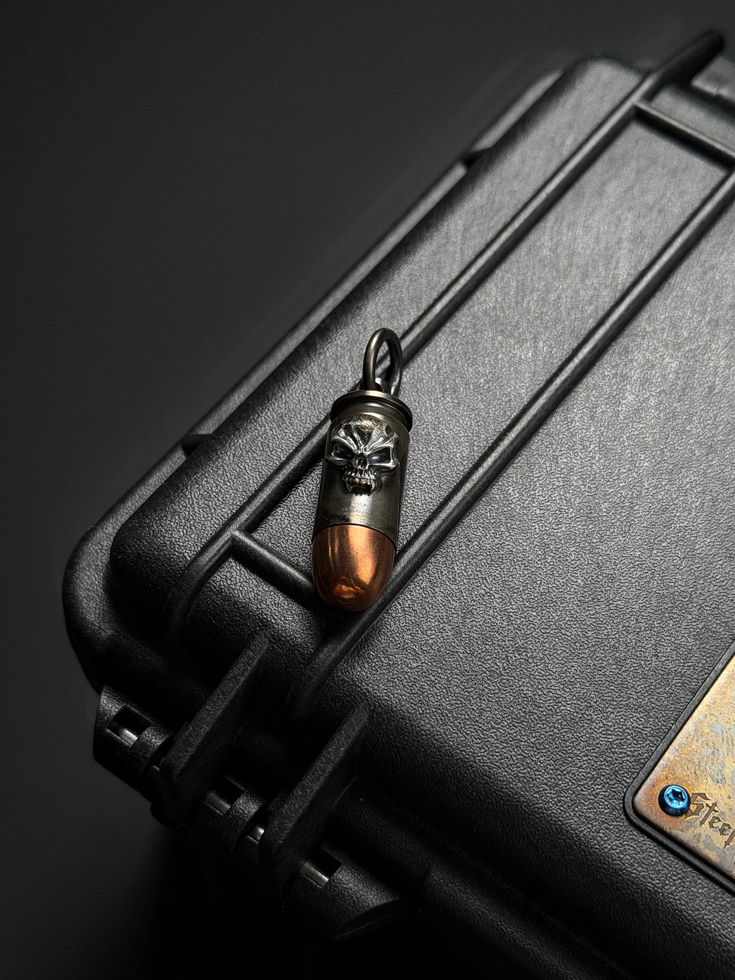 Steel Flame Bullet-Style Waterproof Capsule Pendant | Stainless Steel × Red Copper Body | Inlaid 925 Silver Warrior Skull | Logo Engraved Back
