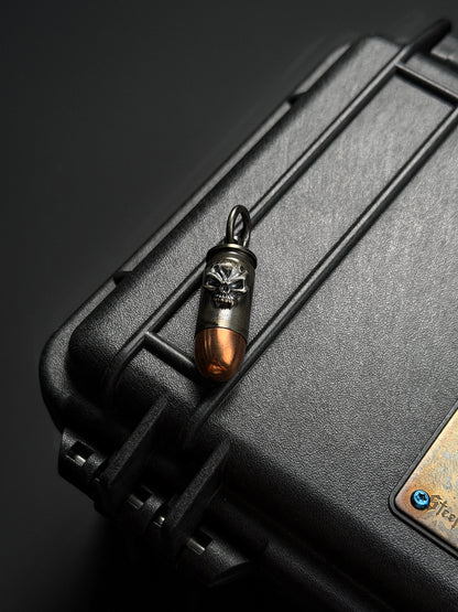 Steel Flame Bullet-Style Waterproof Capsule Pendant | Stainless Steel × Red Copper Body | Inlaid 925 Silver Warrior Skull | Logo Engraved Back