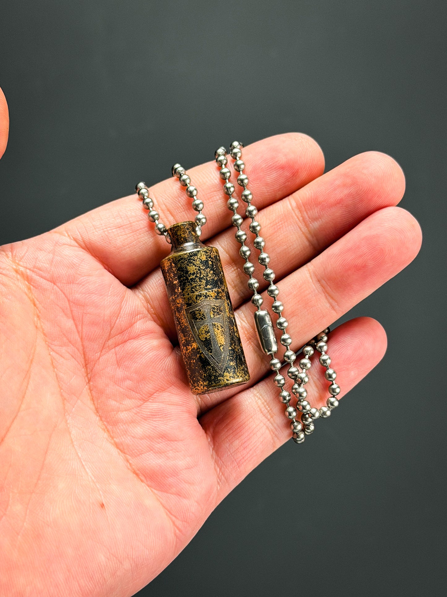 Steel Flame “2D Shield” Pendant – EDC Waterproof Capsule