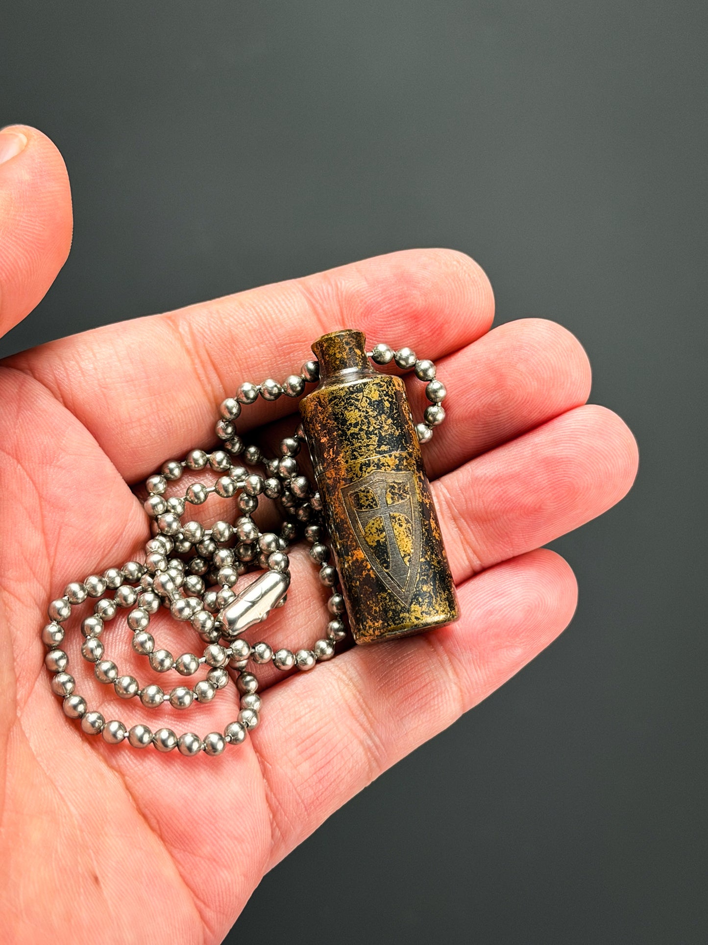 Steel Flame “2D Shield” Pendant – EDC Waterproof Capsule