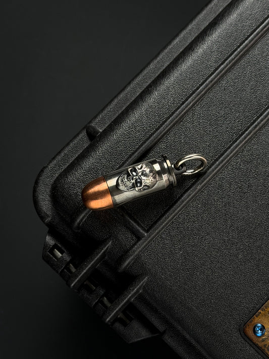 Steel Flame Dark Skull Bullet Pendant – EDC Waterproof Capsule