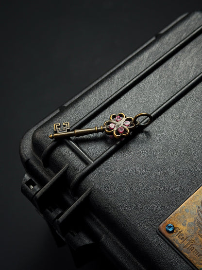Rare Vintage Steel Flame Bronze Key Pendant with Ruby Inlay