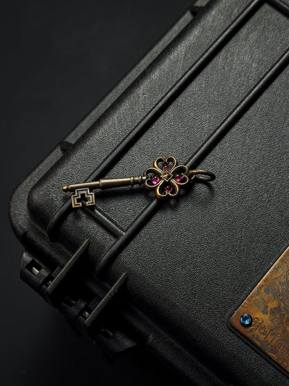 Rare Vintage Steel Flame Bronze Key Pendant with Ruby Inlay