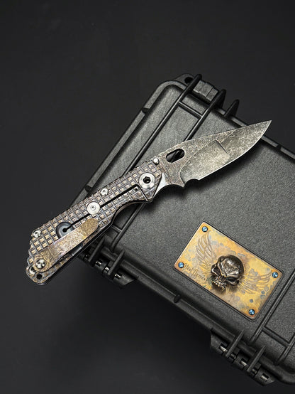 Lava-Carved One-Off | Strider Knives × Monkey Collab – Mike Signed SNG w/ Frag Pattern Titanium Handle