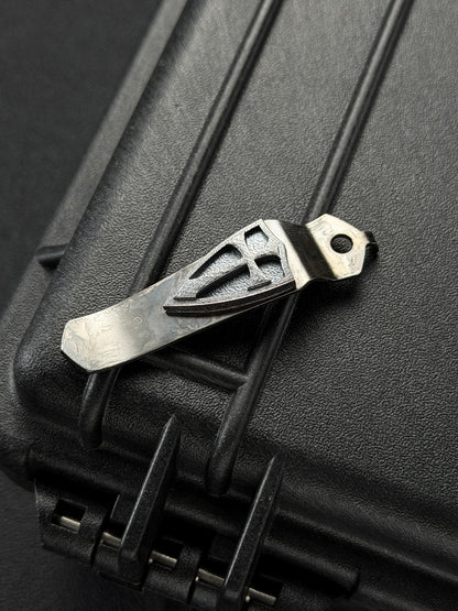 Steel Flame × Starlingear × Strider Knives Collaboration Crusader Orange-Peel Silver Shield Pocket Clip