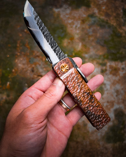 Fat Guard Style Custom Folding Knife – Hand-Forged Damascus San Mai Blade with O1 Core & Hammered Copper Handle (Limited to 20)