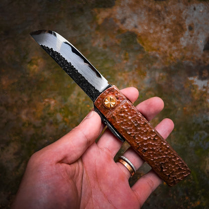 Fat Guard Style Custom Folding Knife – Hand-Forged Damascus San Mai Blade with O1 Core & Hammered Copper Handle (Limited to 20)