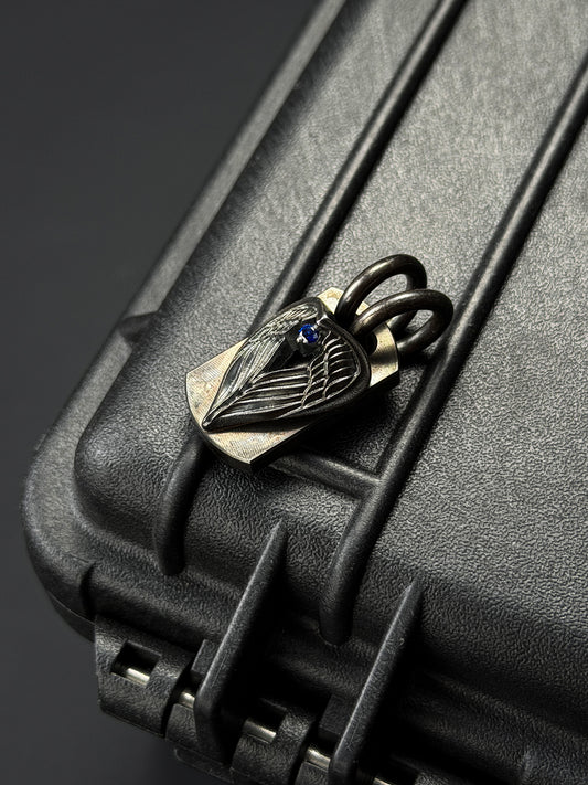Rare Vintage Steel Flame Pendant with Silver Angel Wing and Sapphire Inlay