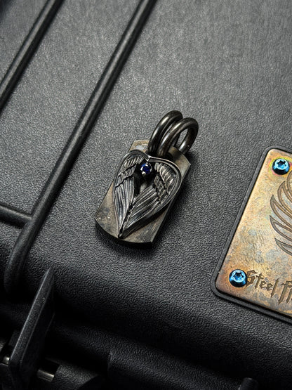 Rare Vintage Steel Flame Pendant with Silver Angel Wing and Sapphire Inlay
