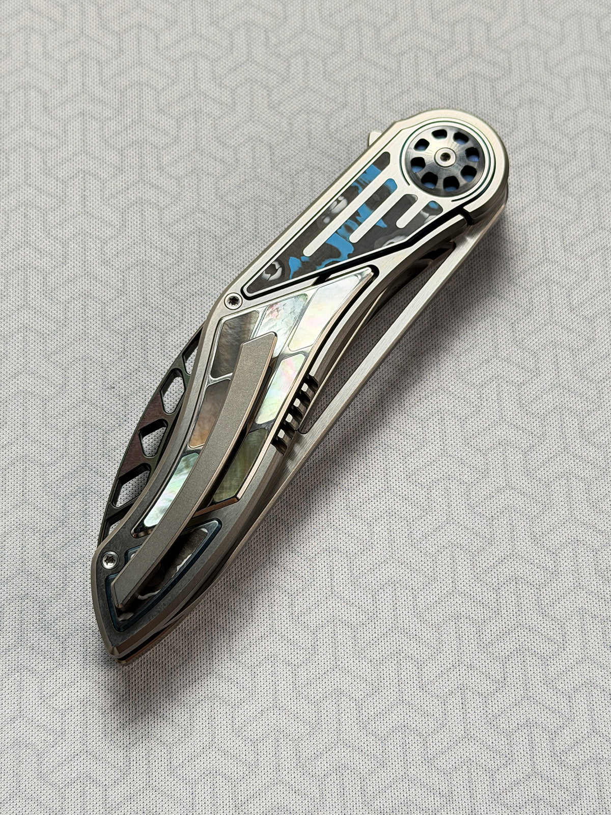 Infinite Charlie Knives | Tianding Quick-Open Folding Knife
Hand-Inlaid Mother-of-Pearl & Ceramic Carbon Fiber