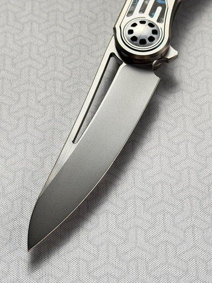 Infinite Charlie Knives | Tianding Quick-Open Folding Knife
Hand-Inlaid Mother-of-Pearl & Ceramic Carbon Fiber