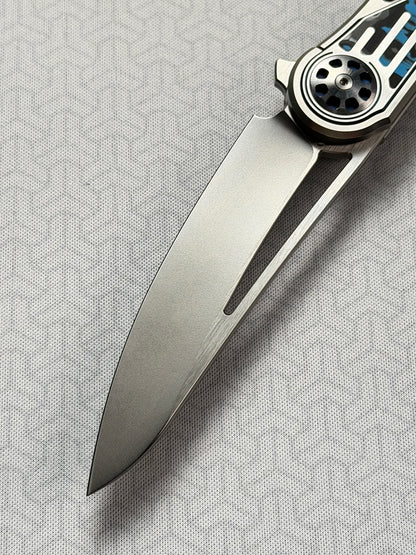 Infinite Charlie Knives | Tianding Quick-Open Folding Knife
Hand-Inlaid Mother-of-Pearl & Ceramic Carbon Fiber