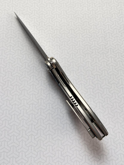 Infinite Charlie Knives | Tianding Quick-Open Folding Knife
Hand-Inlaid Mother-of-Pearl & Ceramic Carbon Fiber