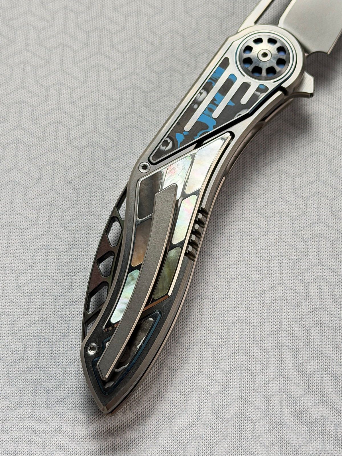 Infinite Charlie Knives | Tianding Quick-Open Folding Knife
Hand-Inlaid Mother-of-Pearl & Ceramic Carbon Fiber