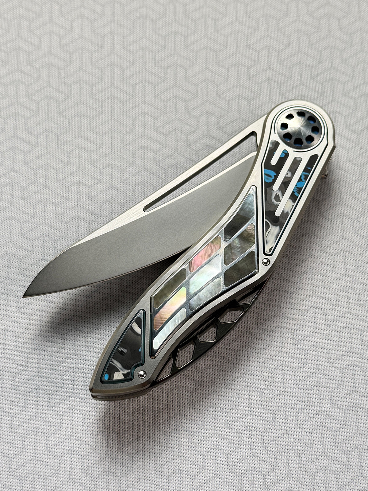 Infinite Charlie Knives | Tianding Quick-Open Folding Knife
Hand-Inlaid Mother-of-Pearl & Ceramic Carbon Fiber
