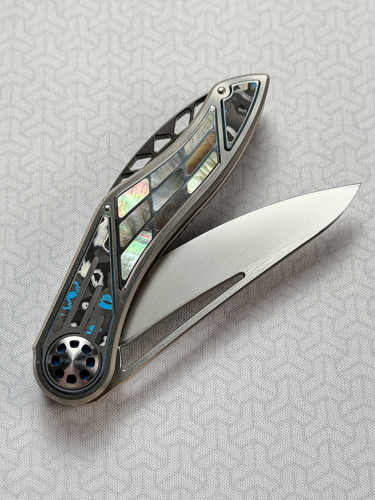 Infinite Charlie Knives | Tianding Quick-Open Folding Knife
Hand-Inlaid Mother-of-Pearl & Ceramic Carbon Fiber