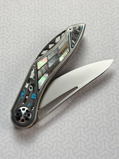 Infinite Charlie Knives | Tianding Quick-Open Folding Knife
Hand-Inlaid Mother-of-Pearl & Ceramic Carbon Fiber