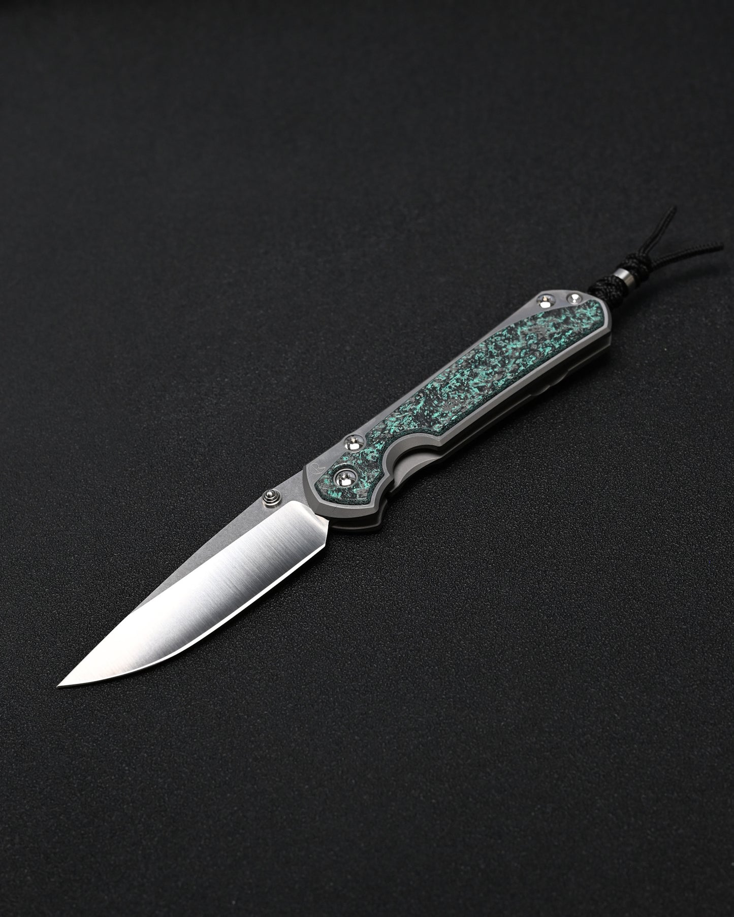 Chris Reeve Knives Large Sebenza 31 – Teal Magnetic CarboTi Inlay / Polished MagnaCut Drop Point / Silver Double Lugs