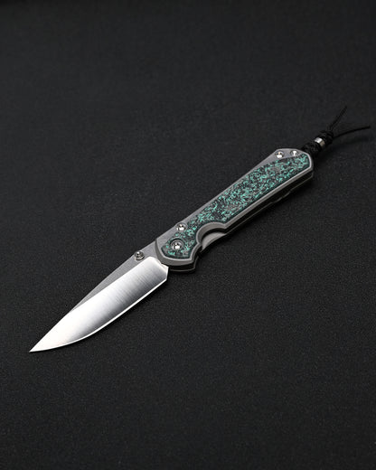 Chris Reeve Knives Large Sebenza 31 – Teal Magnetic CarboTi Inlay / Polished MagnaCut Drop Point / Silver Double Lugs
