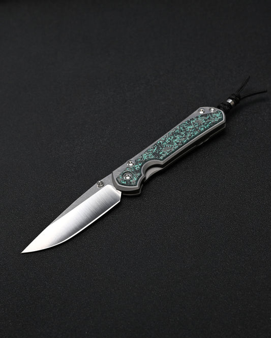 Chris Reeve Knives Large Sebenza 31 – Teal Magnetic CarboTi Inlay / Polished MagnaCut Drop Point / Silver Double Lugs