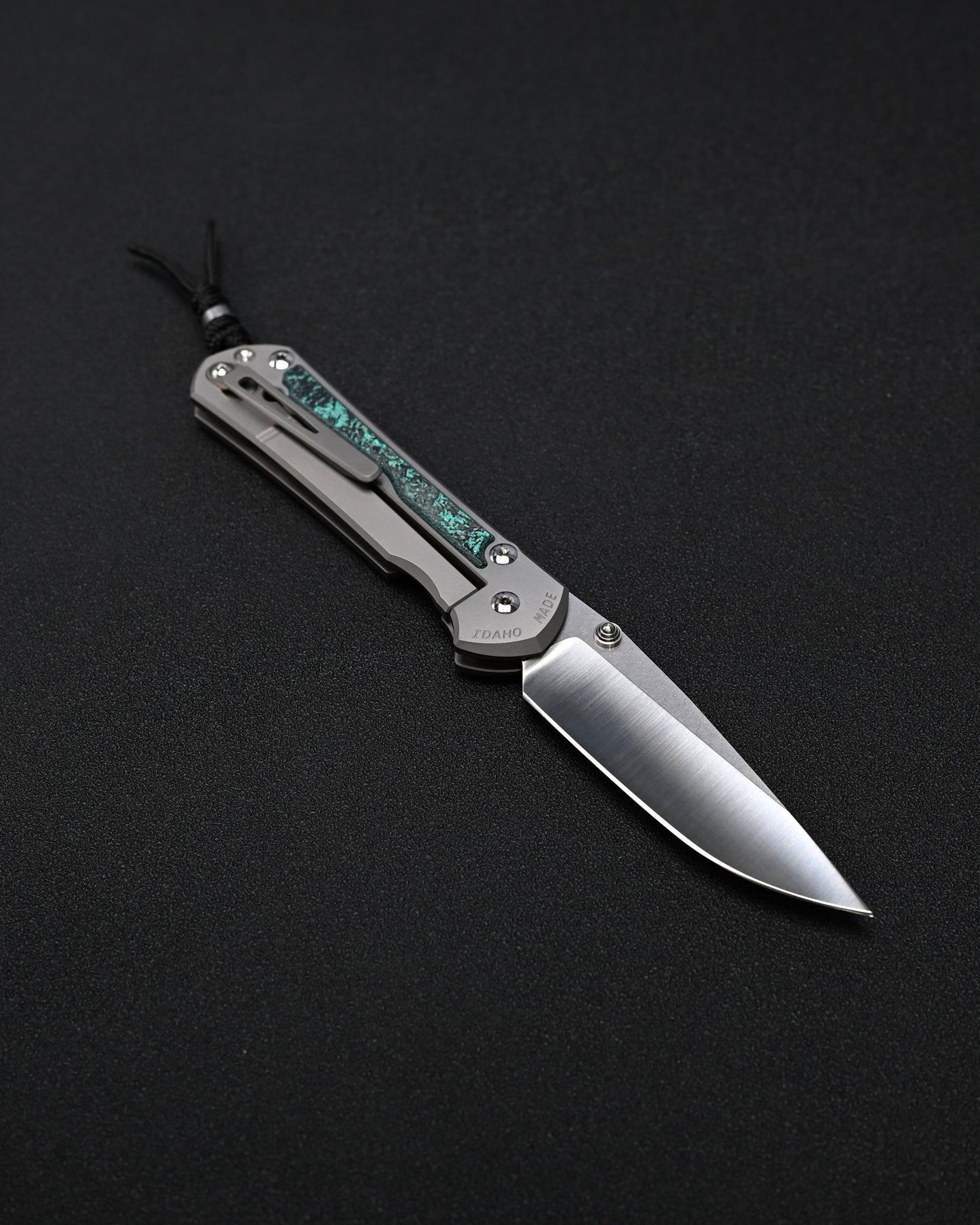 Chris Reeve Knives Large Sebenza 31 – Teal Magnetic CarboTi Inlay / Polished MagnaCut Drop Point / Silver Double Lugs