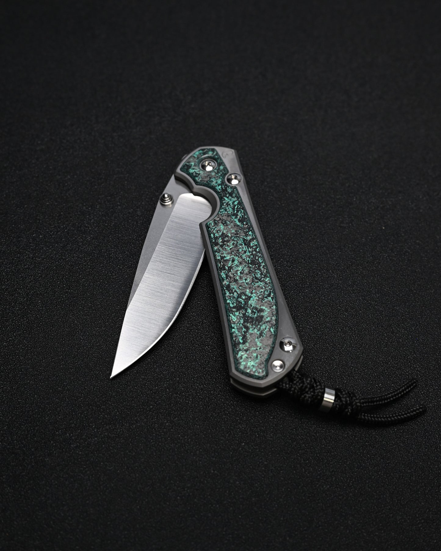 Chris Reeve Knives Large Sebenza 31 – Teal Magnetic CarboTi Inlay / Polished MagnaCut Drop Point / Silver Double Lugs