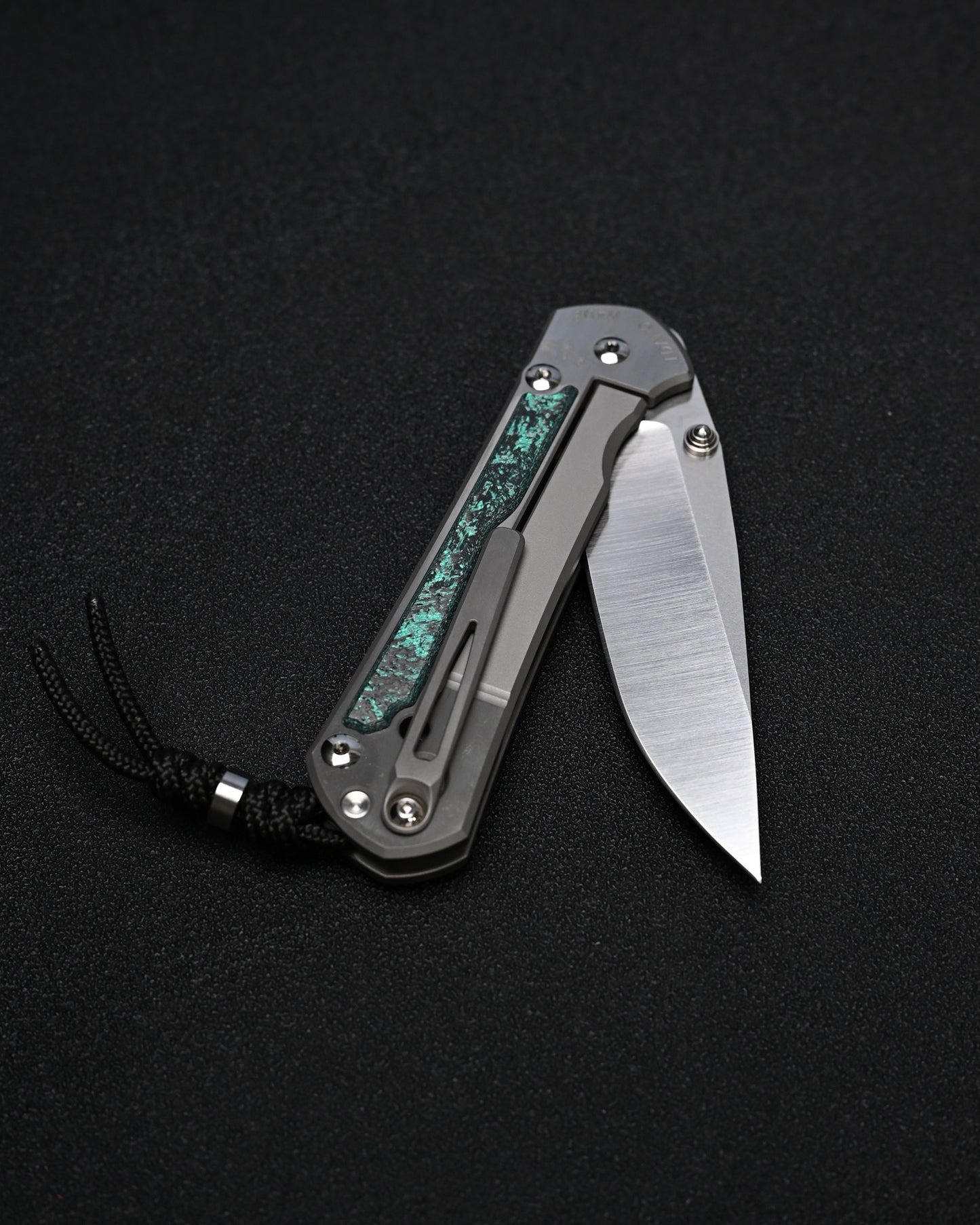 Chris Reeve Knives Large Sebenza 31 – Teal Magnetic CarboTi Inlay / Polished MagnaCut Drop Point / Silver Double Lugs