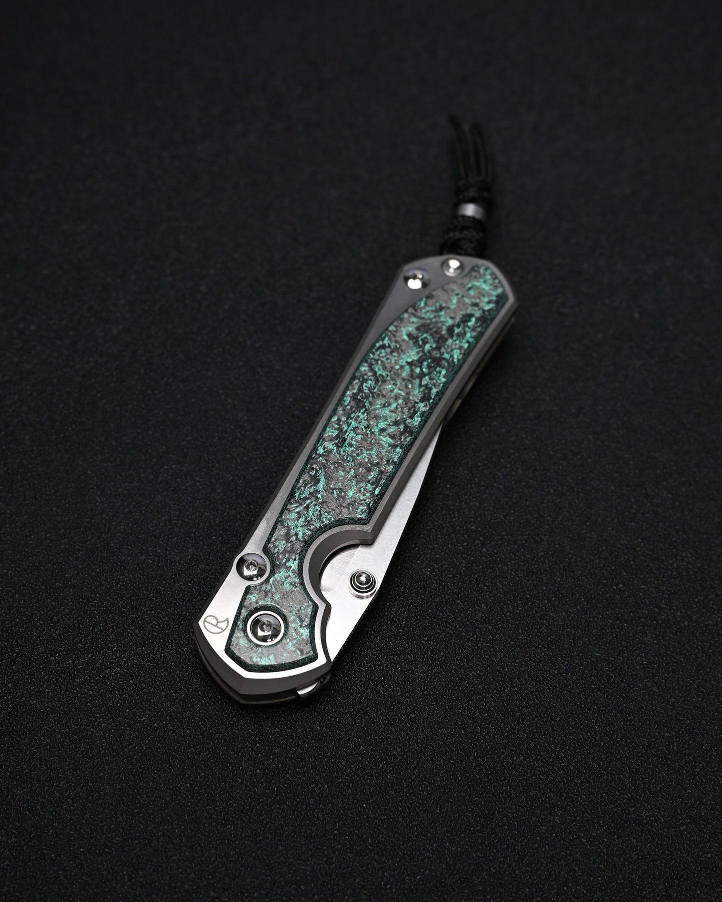 Chris Reeve Knives Large Sebenza 31 – Teal Magnetic CarboTi Inlay / Polished MagnaCut Drop Point / Silver Double Lugs
