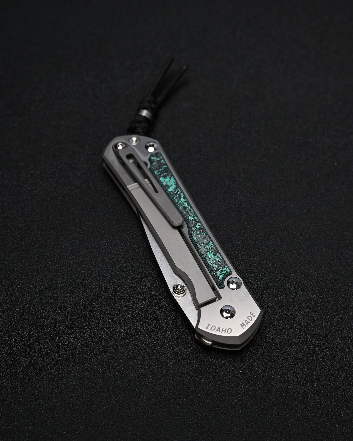 Chris Reeve Knives Large Sebenza 31 – Teal Magnetic CarboTi Inlay / Polished MagnaCut Drop Point / Silver Double Lugs