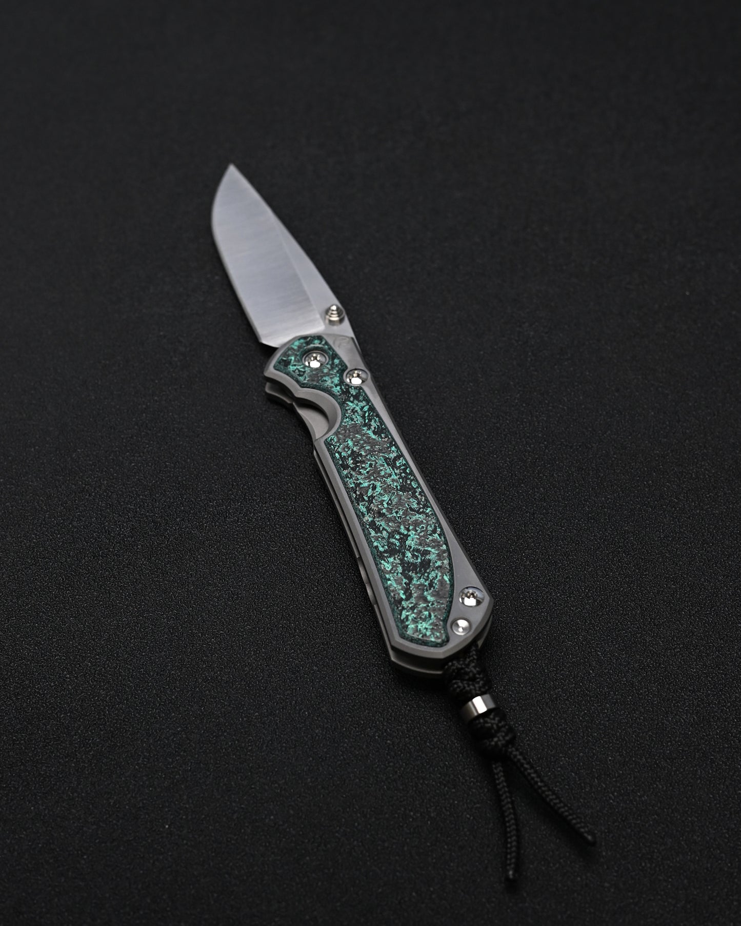 Chris Reeve Knives Large Sebenza 31 – Teal Magnetic CarboTi Inlay / Polished MagnaCut Drop Point / Silver Double Lugs