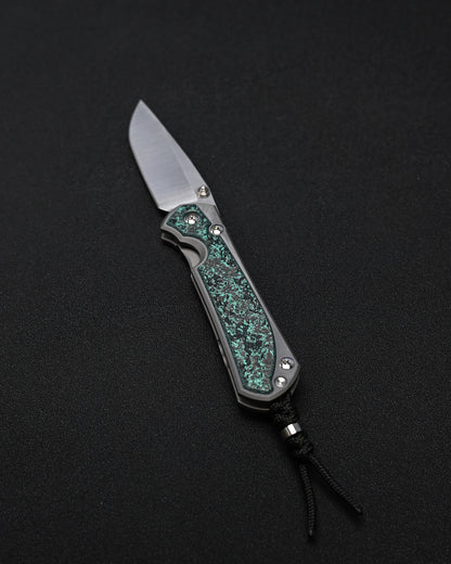 Chris Reeve Knives Large Sebenza 31 – Teal Magnetic CarboTi Inlay / Polished MagnaCut Drop Point / Silver Double Lugs