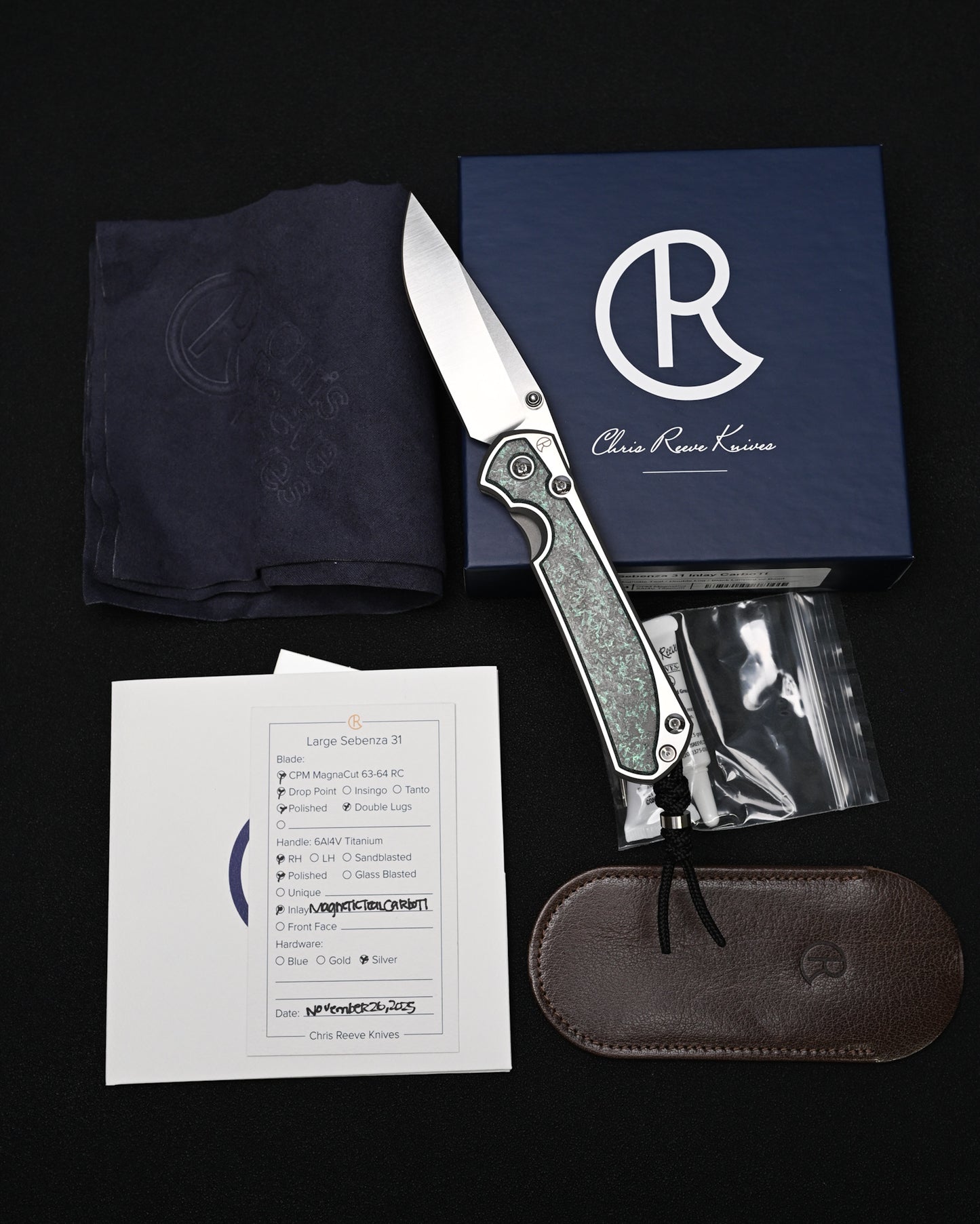 Chris Reeve Knives Large Sebenza 31 – Teal Magnetic CarboTi Inlay / Polished MagnaCut Drop Point / Silver Double Lugs