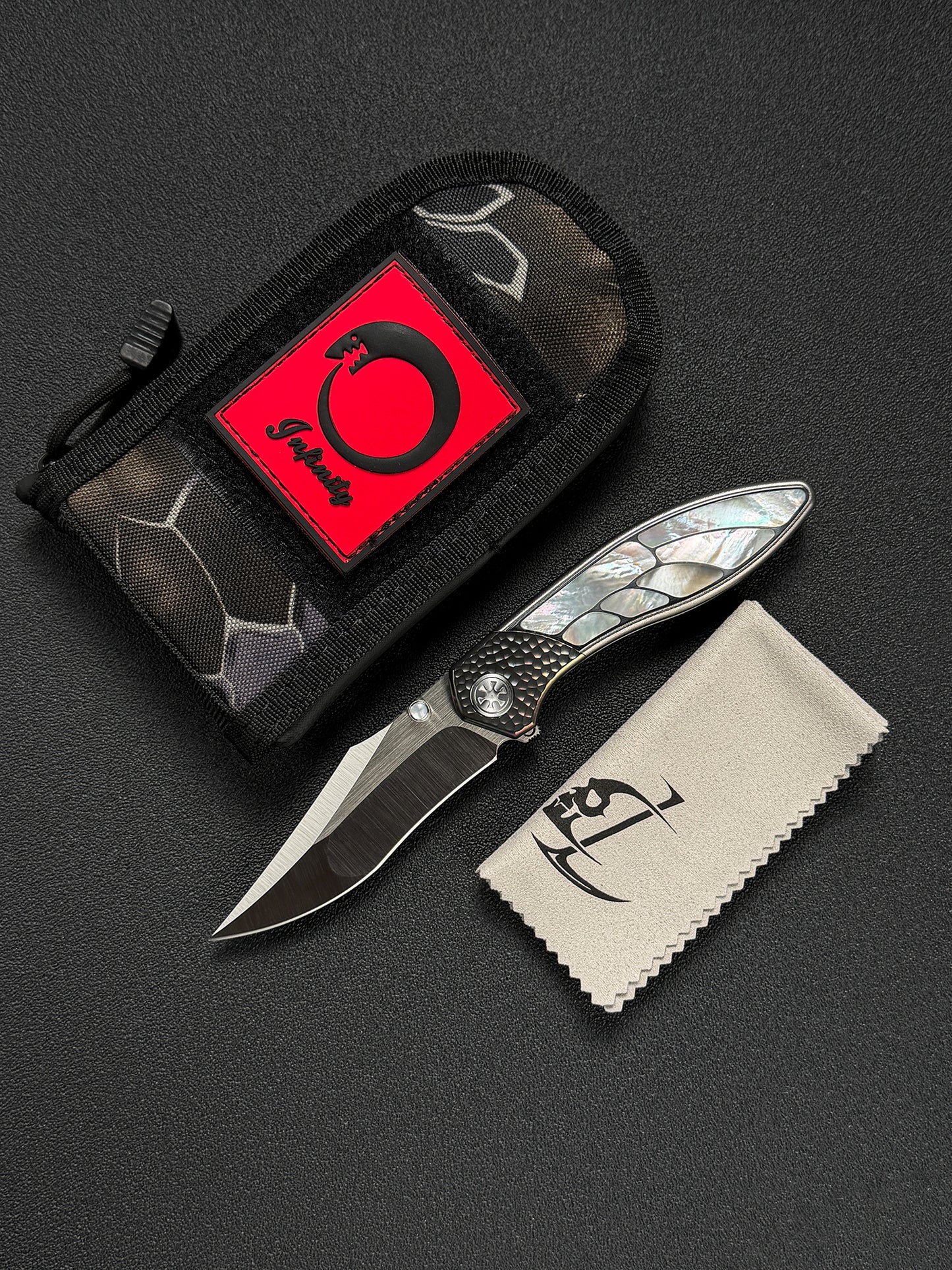 Infinite Charlie Knives Raku II M390 Brushed Hollow-Ground Titanium Mother-of-Pearl Custom Folding Knife