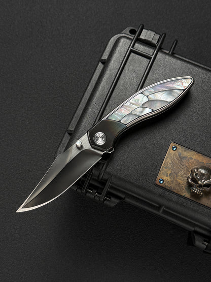 Infinite Charlie Knives Raku II M390 titanium folding knife with mother-of-pearl inlay
