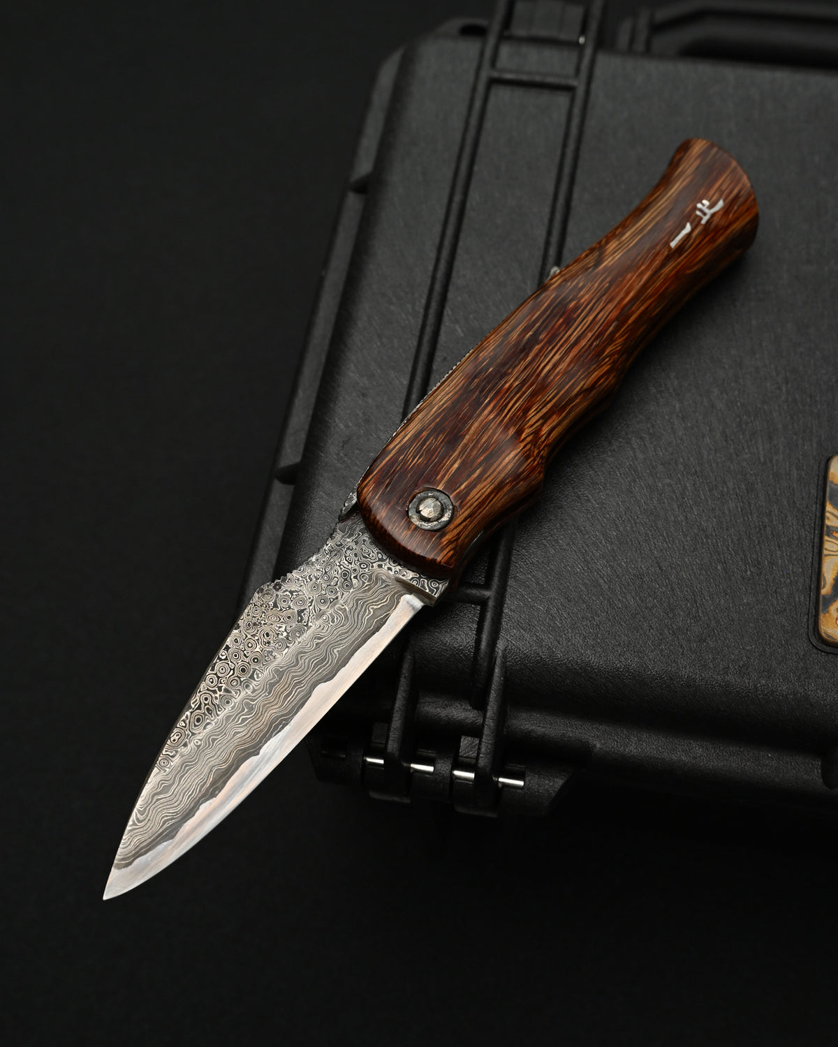 Kazushi Machida handmade Japanese Higonokami-style folding knife featuring a hand-forged Damascus blade and one-piece natural wood handle.
