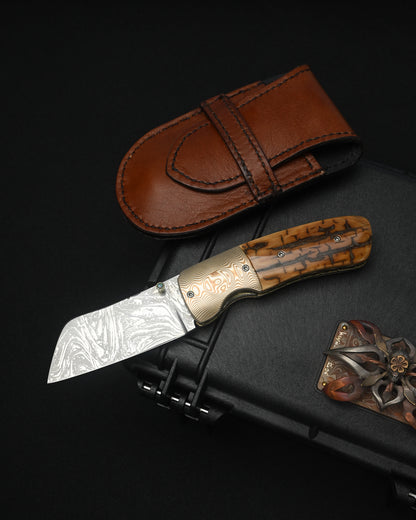 Kazuyuki Sakurai Shiden handmade RWL-34 custom folding knife with Mokume Gane bolsters and mammoth ivory handle