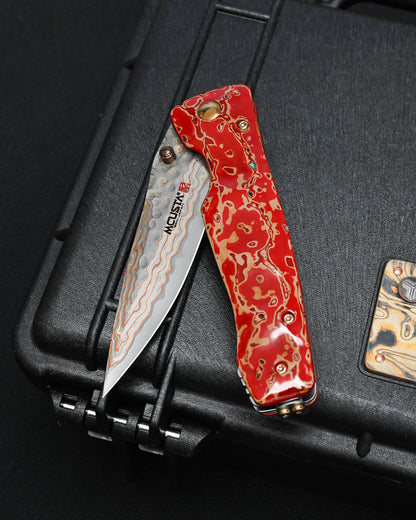 MCUSTA MATOUEN Limited Edition Japanese Folding Knife – Copper & Brass Damascus / V-Toku 2 Steel / Ironwood / Traditional Kiso Tsuishu Lacquer
