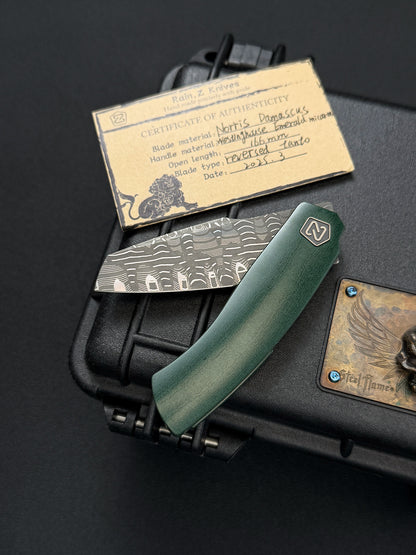 Rare Rain.Z Knives Custom Folding Knife – Norris TanPai Damascus / Westinghouse Emerald Micarta / Zirconium Pivot