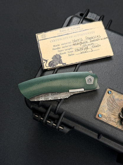 Rare Rain.Z Knives Custom Folding Knife – Norris TanPai Damascus / Westinghouse Emerald Micarta / Zirconium Pivot