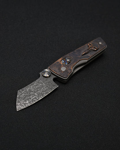 Serge Knives Guppy Custom – Copper Plague Doctor Inlay / Antiqued W2 Blade / Heat-Anodized Titanium – Made in USA