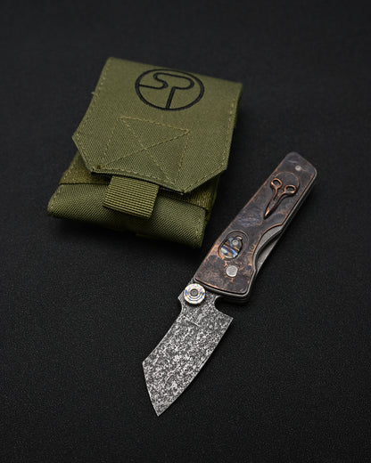 Serge Knives Guppy Custom – Copper Plague Doctor Inlay / Antiqued W2 Blade / Heat-Anodized Titanium – Made in USA